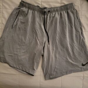 Nike Men’s Light Gray Athletic Shorts with Black Drawstring